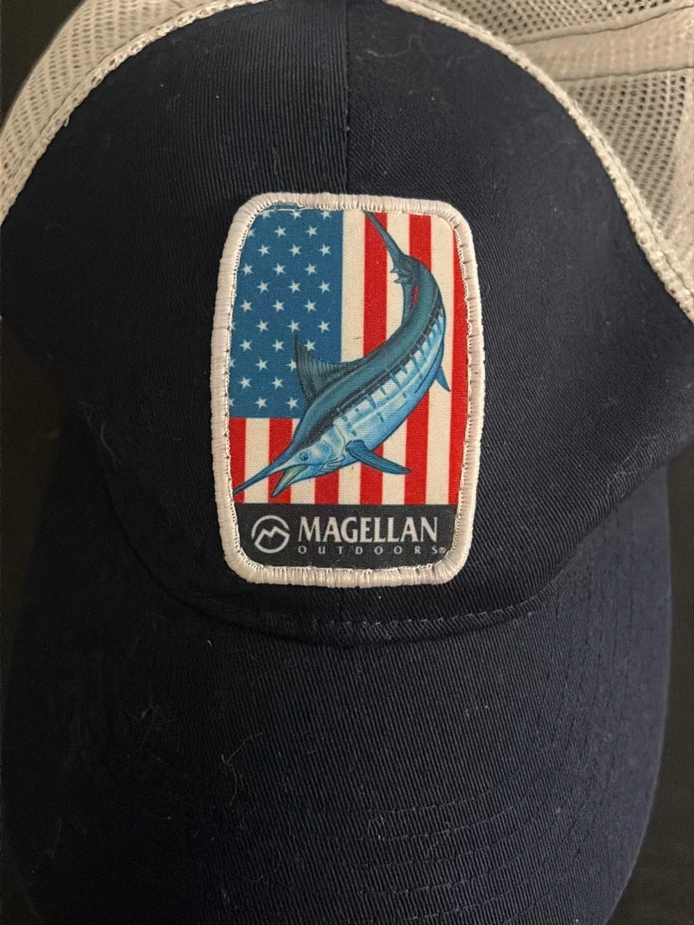Magellan Outdoors Navy and White Trucker Hat with Marlin Patch